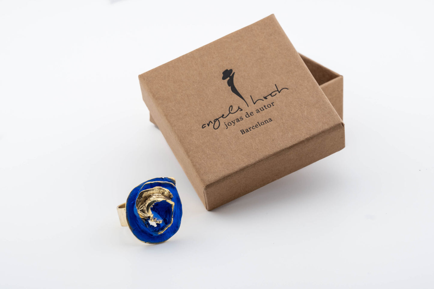 Ona Viva Ring in blue with gold-tone band, shown with branded gift box