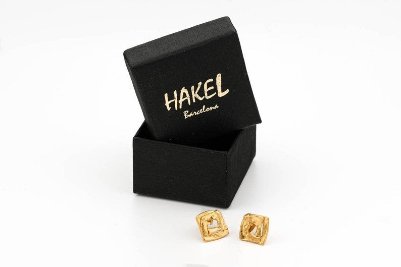 Gold antique square frame stud earrings with open center
