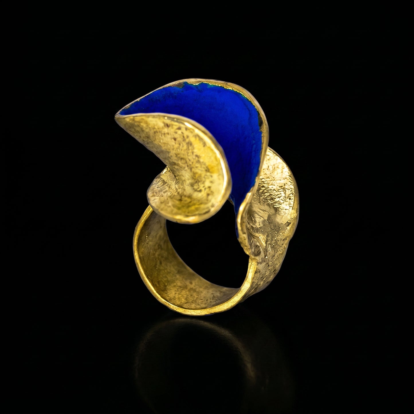 Gold and blue statement ring with oval blue inlay