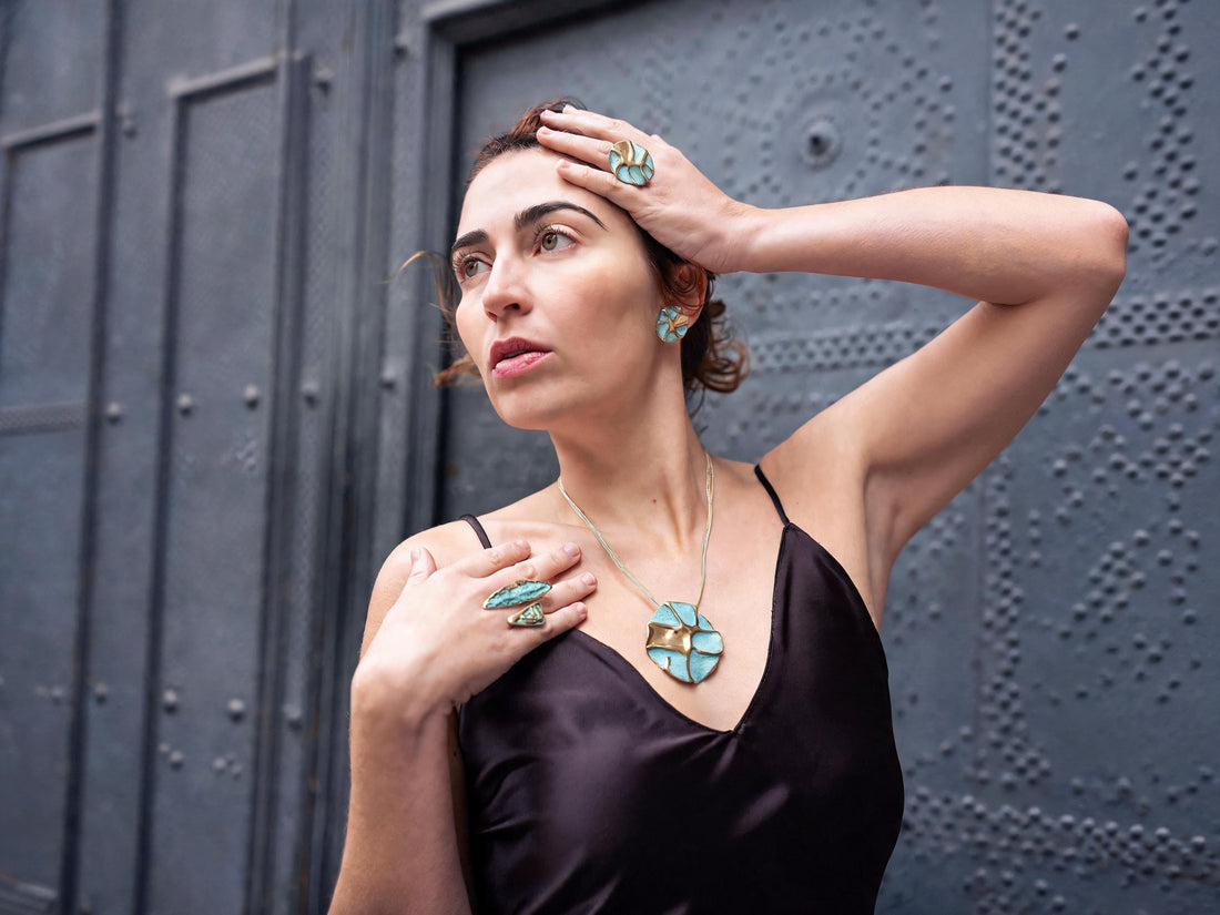 Face-inspired sculptural jewelry influenced by Cubist visual language