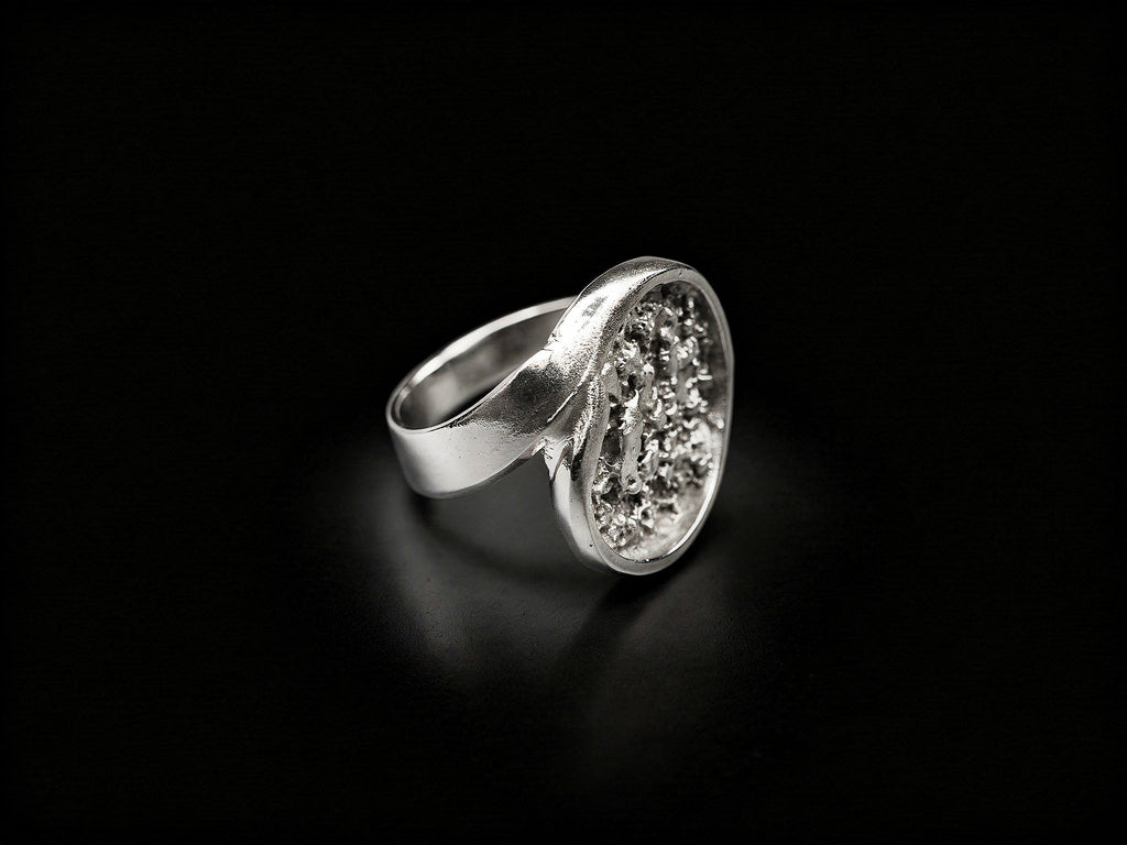 925 sterling silver ring with oval druzy-style face, angled top view