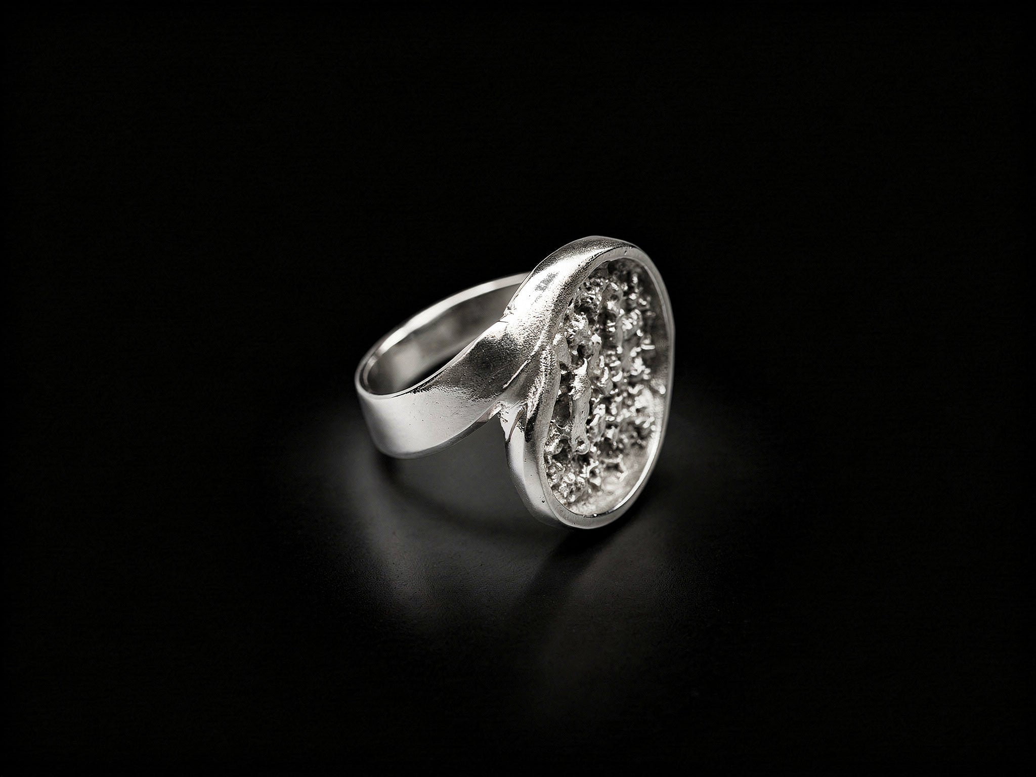 925 sterling silver ring with oval druzy-style face, angled top view