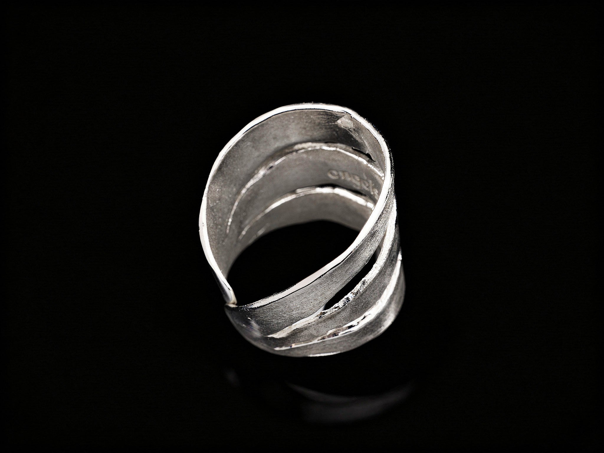 925 sterling silver ring, side view with curved layered bands and open center