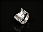 925 sterling silver ring, front view with sculpted overlapping bands and hollow cutout