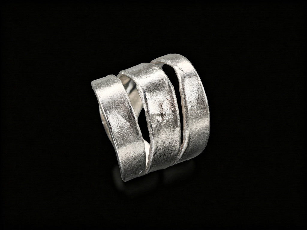 925 sterling silver ring, close side view with wide cuff-like layered bands