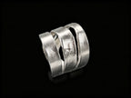925 sterling silver ring, close side view with wide cuff-like layered bands