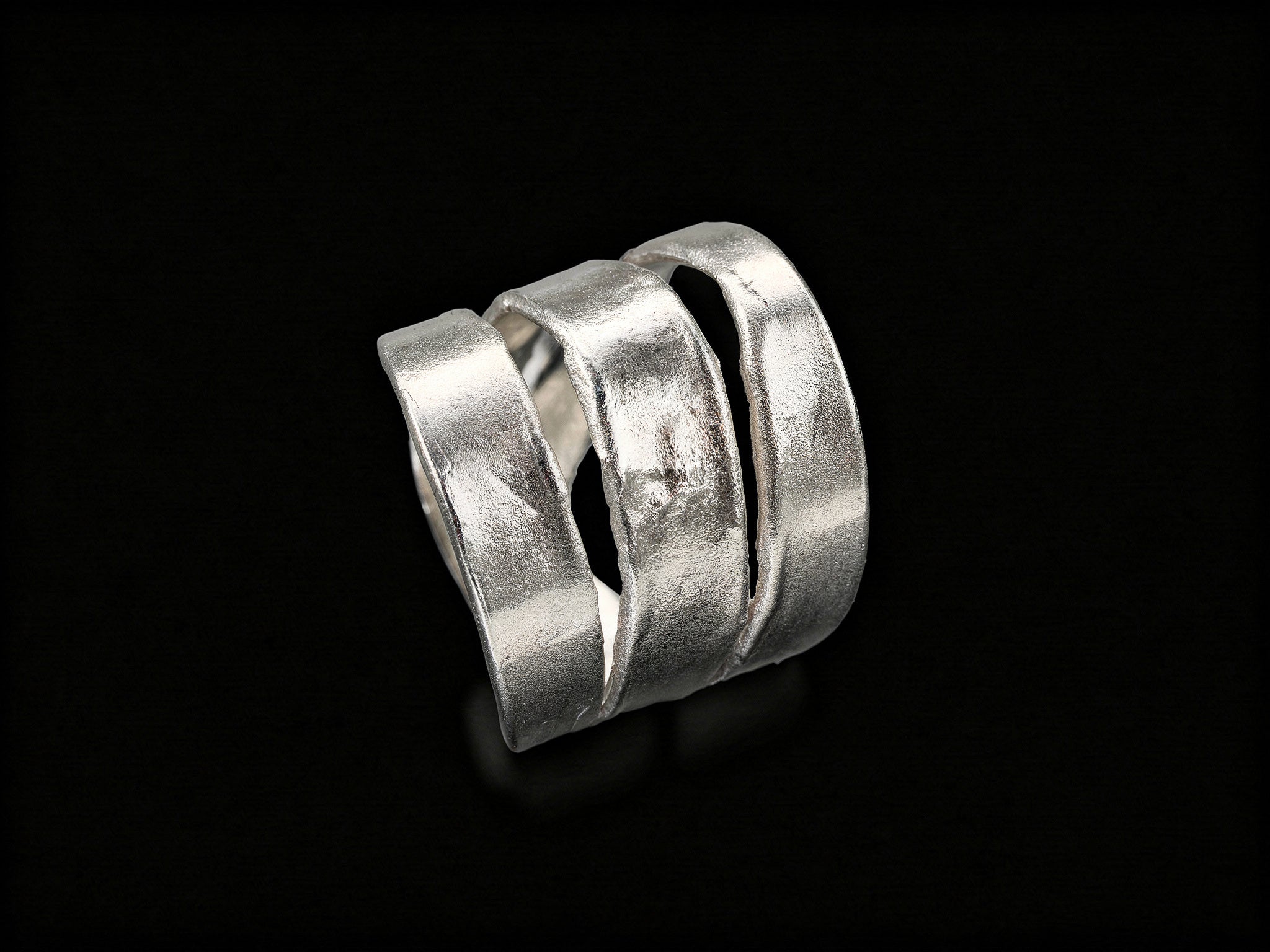 925 sterling silver ring, close side view with wide cuff-like layered bands