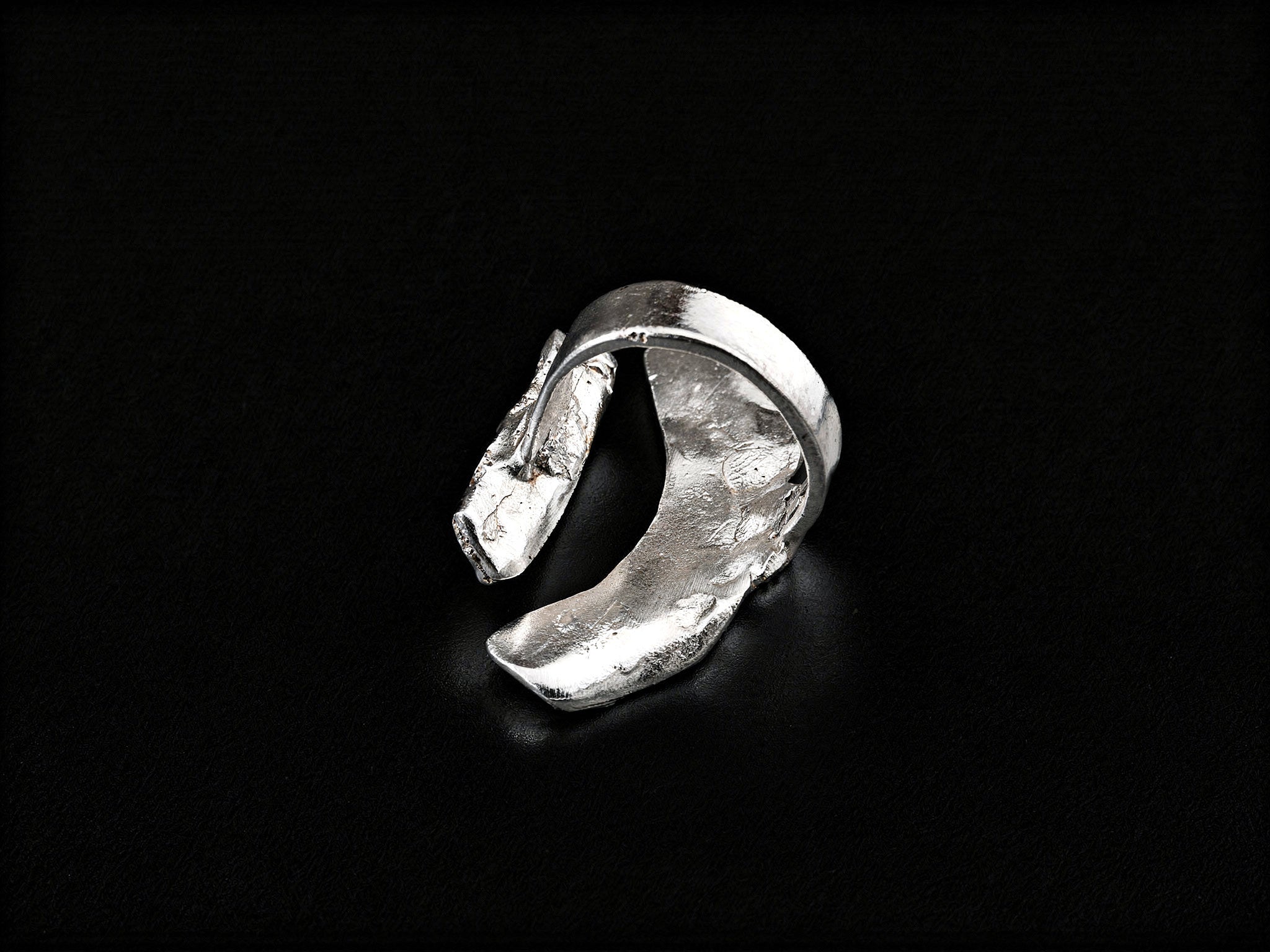 Sterling silver ring, curved open band with textured rectangular top detail