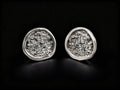 925 sterling silver oval stud earrings with textured center and polished edge