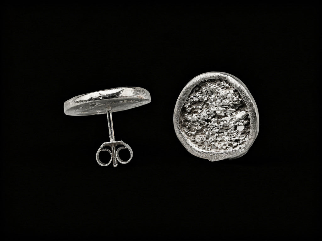 925 sterling silver oval stud earring with textured front and post with butterfly back