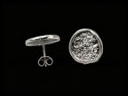 925 sterling silver oval stud earring with textured front and post with butterfly back
