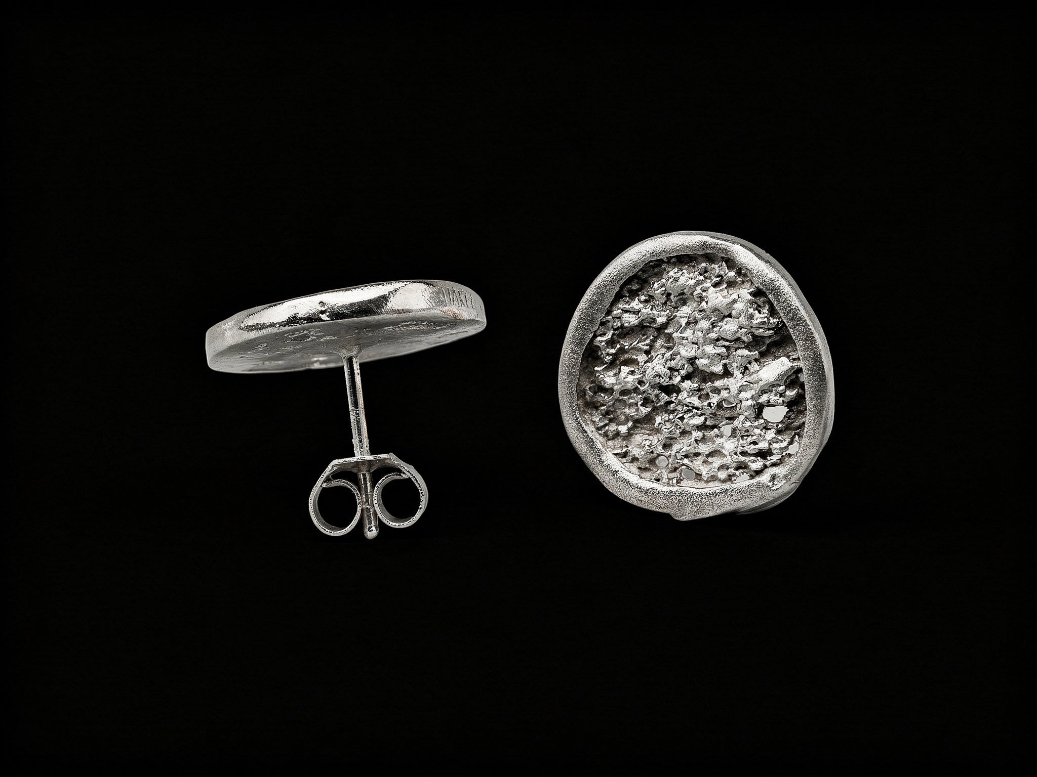 925 sterling silver oval stud earring with textured front and post with butterfly back