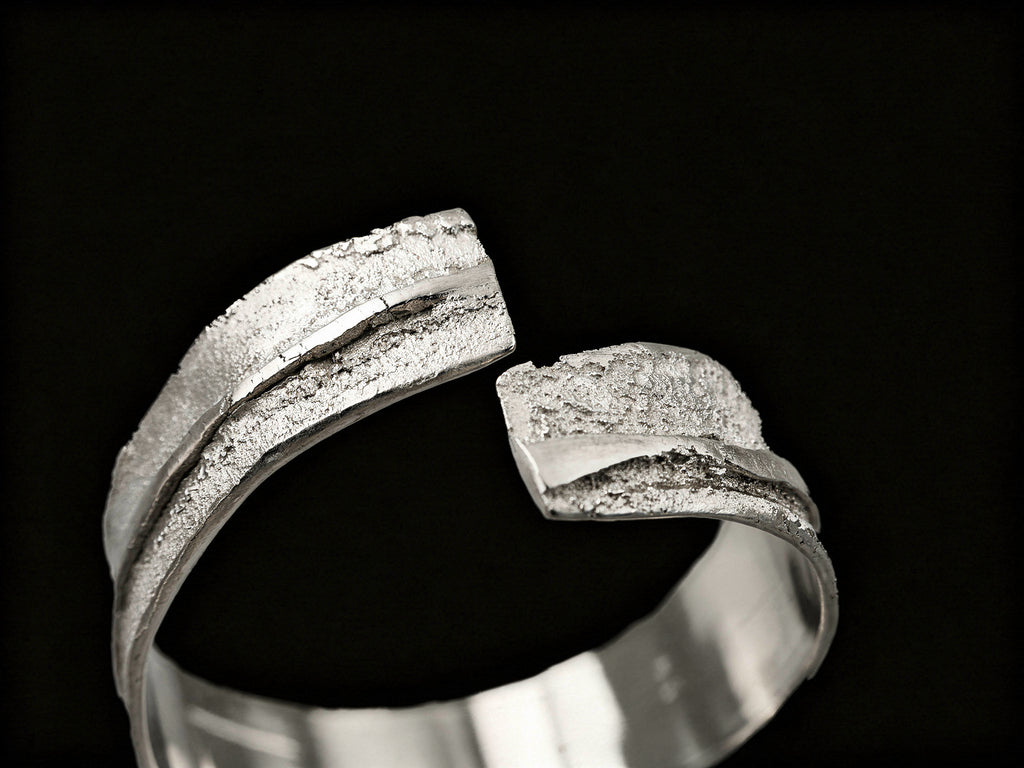 925 sterling silver cuff bracelet with textured channel band and open front