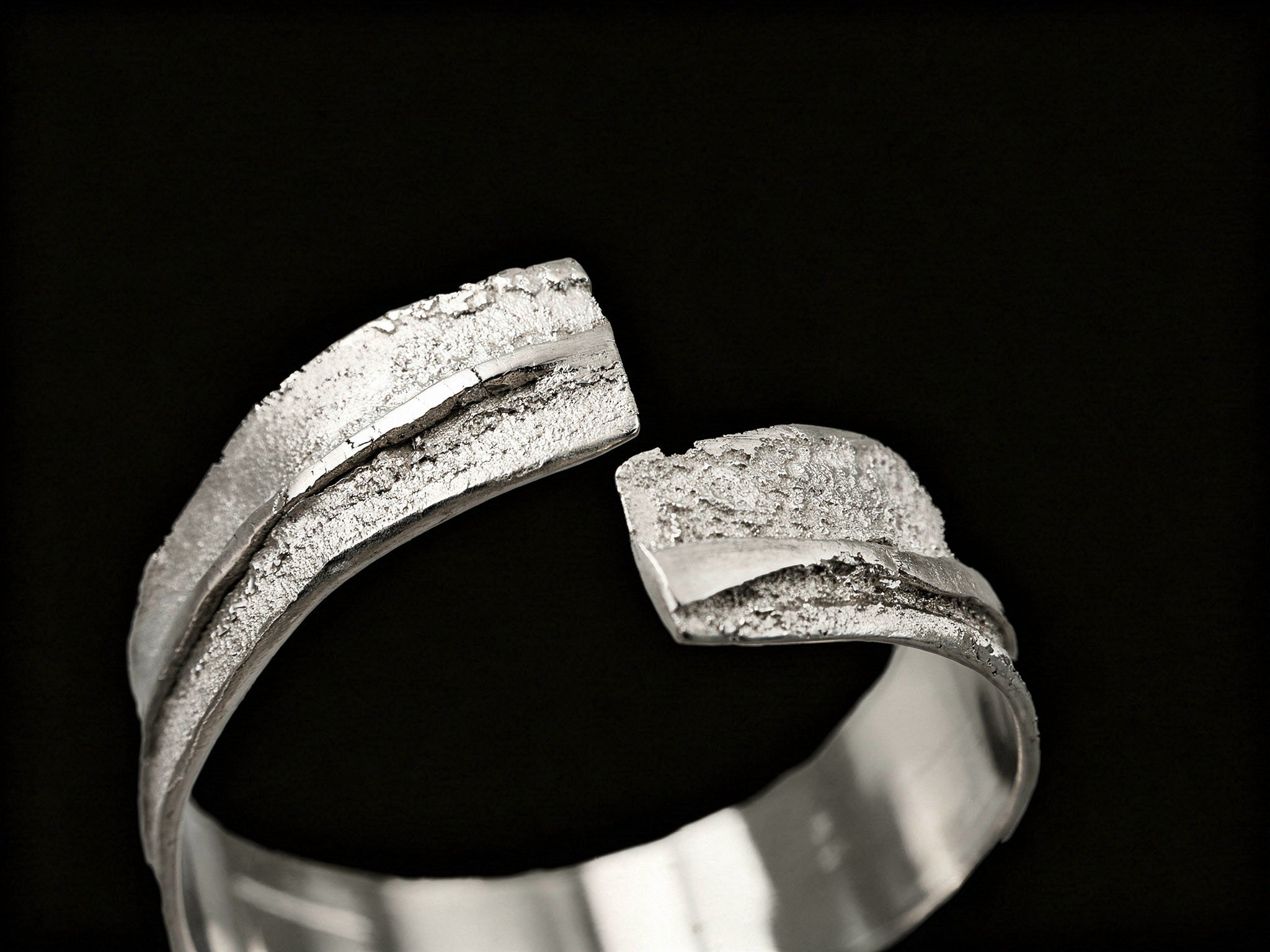 925 sterling silver cuff bracelet with textured channel band and open front