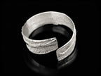 925 sterling silver cuff bracelet with open front and stippled textured finish