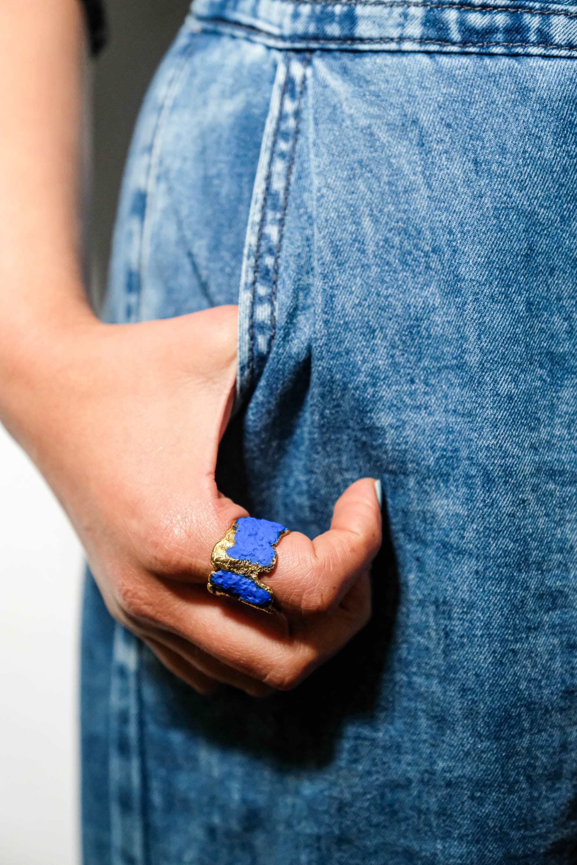 Turquoise-blue square stone ring in gold-tone setting