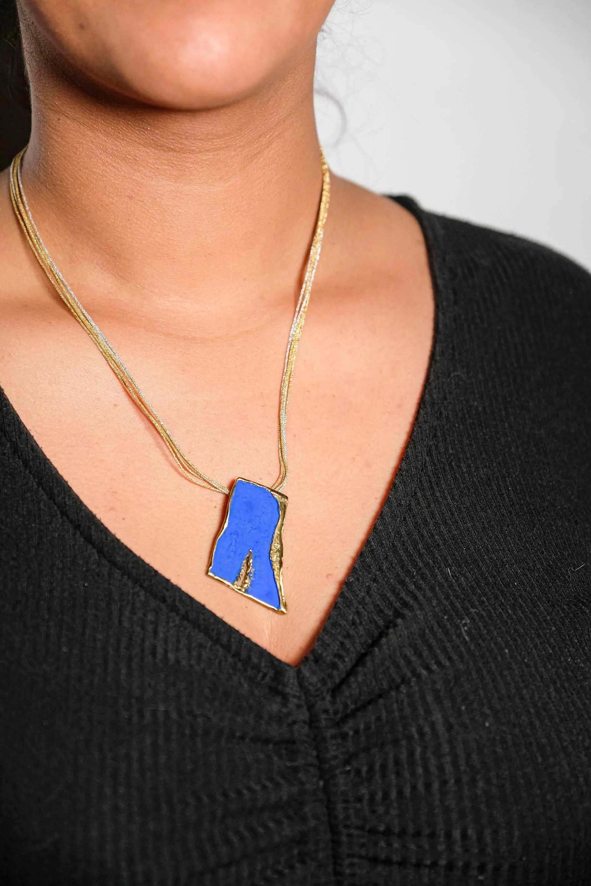 Strata Necklace in gold-plated bronze with sculptural design
