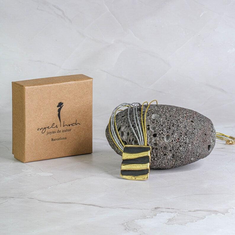 Pharaoh’s Horizon Necklace in gold-plated bronze with sculptural design