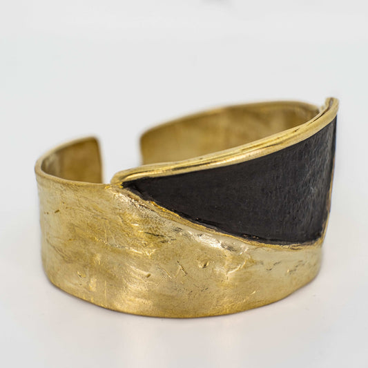 Gold Cuff Bracelet in gold-plated bronze with sculptural design
