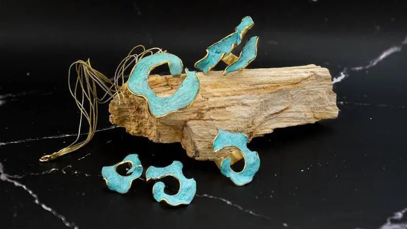 Eterna C turquoise enamel earrings with gold-tone edging, small sculpted openwork pieces