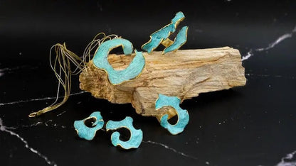 Eterna C turquoise enamel earrings with gold-tone edging, small sculpted openwork pieces