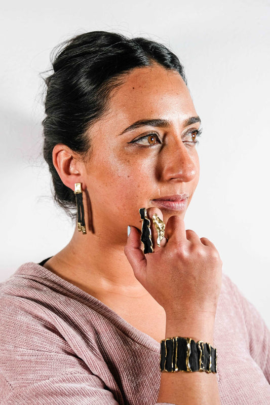 Sculpted Gold Cuff Bracelet in gold-plated metal with sculptural design