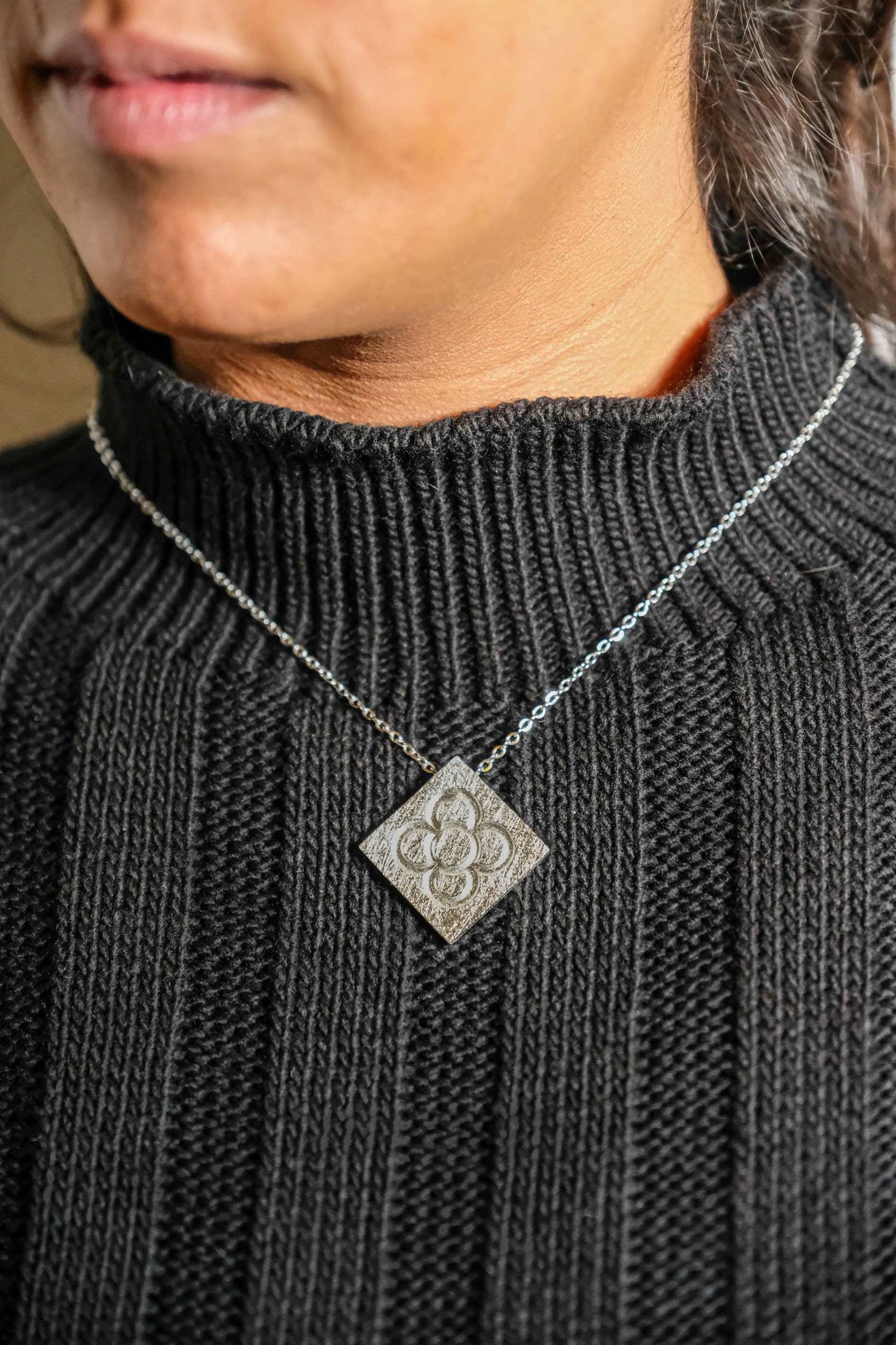 Silver square flower pendant on chain necklace