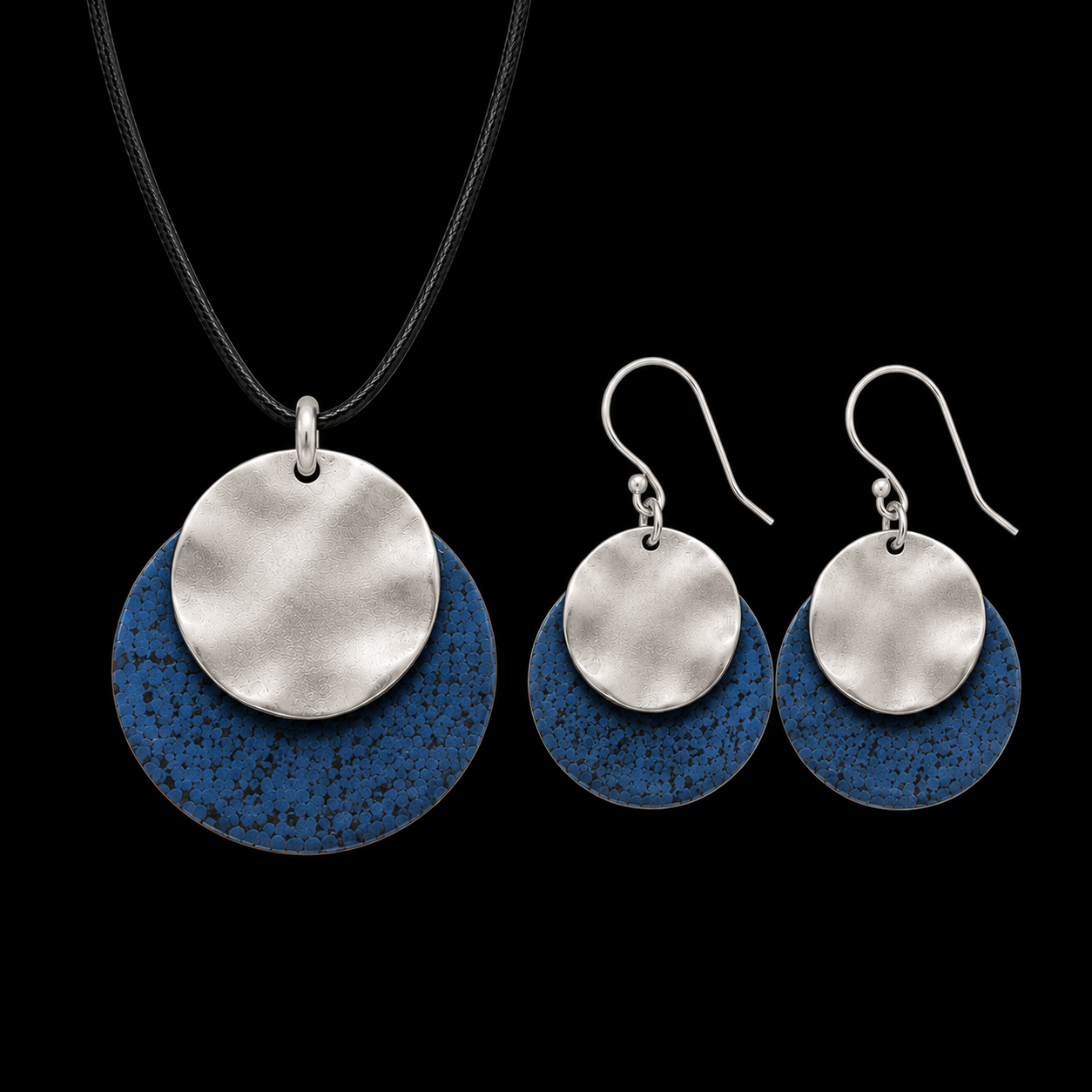 Silver-tone pendant necklace and drop earrings with silver discs and blue textured backing