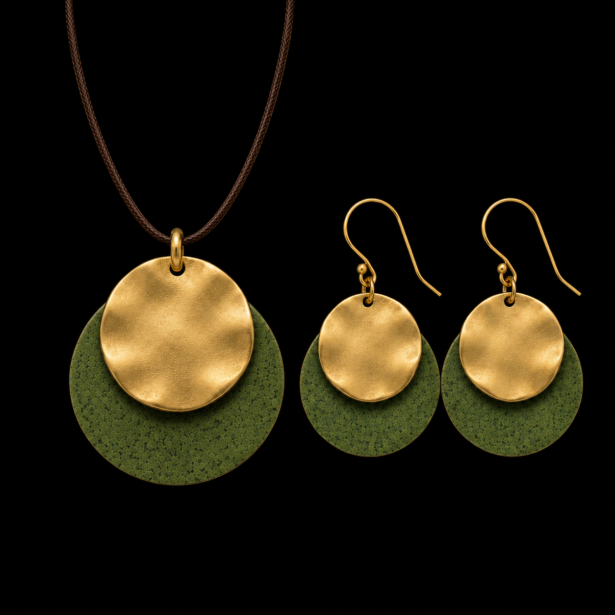 Gold-tone pendant necklace and drop earrings with gold discs and green textured backing
