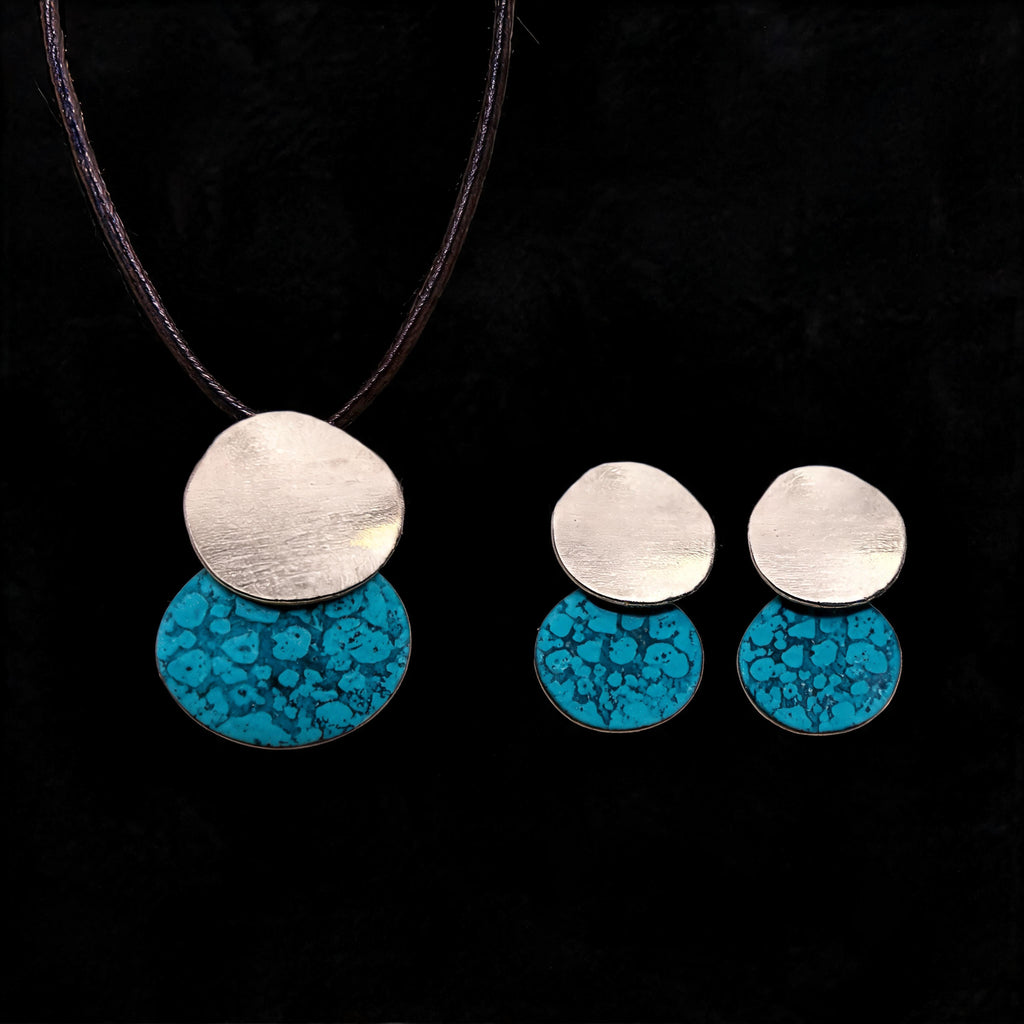 Pendant necklace and stud earring set with silver discs and turquoise patterned drops