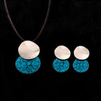 Pendant necklace and stud earring set with silver discs and turquoise patterned drops