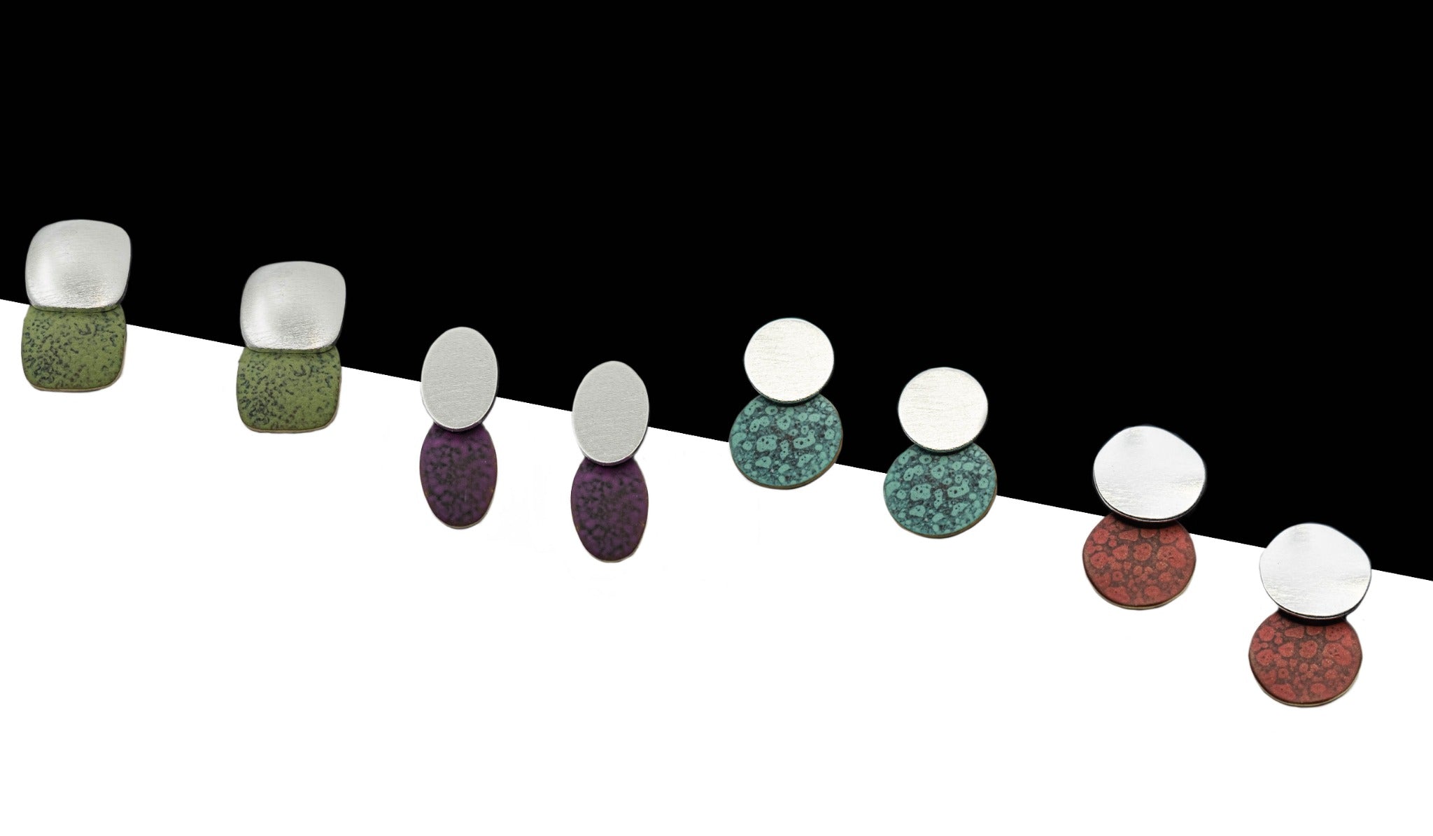 Multicolor circular disc earring set with hook backs on a display strand