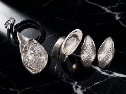 Silver Echo Ring side view with sculptural profile