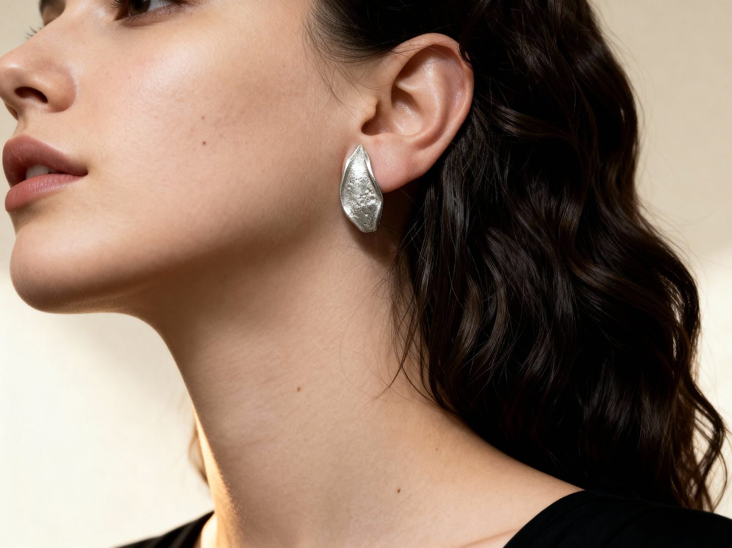 Silver Echo Earrings side view with sculptural profile