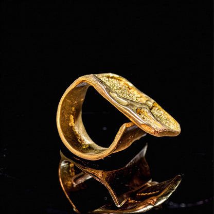 18K gold modernist ring with sculpted top and cutout arch detail