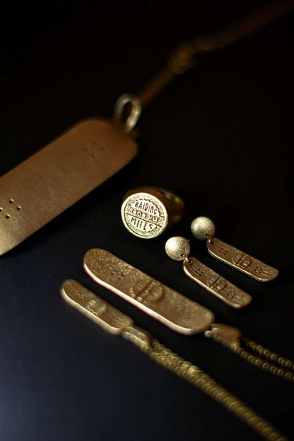 Skateboard Stud Movement Earrings handcrafted jewelry detail