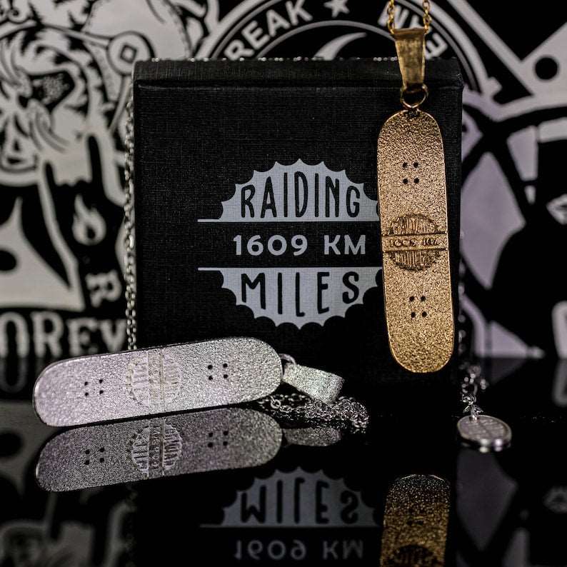Skateboard Necklace detail showing artisanal texture