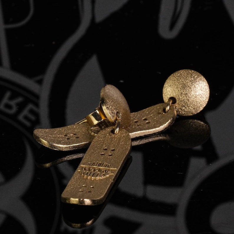 Skateboard Stud Movement Earrings side view with sculptural profile