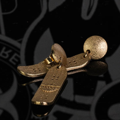 Skateboard Stud Movement Earrings side view with sculptural profile