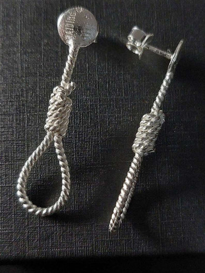Silver rope-shaped stud earrings with round tops and twisted rope teardrop drops