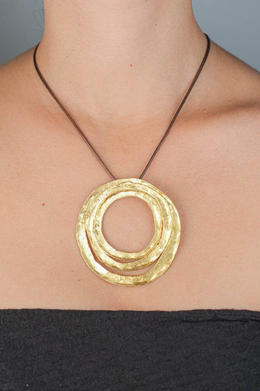 Spiralis Aeternum Necklace in gold or silver plated metal with geometric design