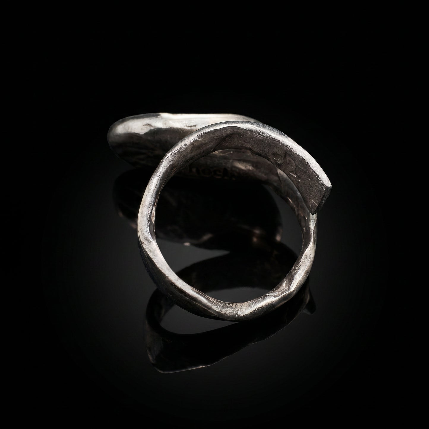 Silver-tone open oval ring band with curved silhouette