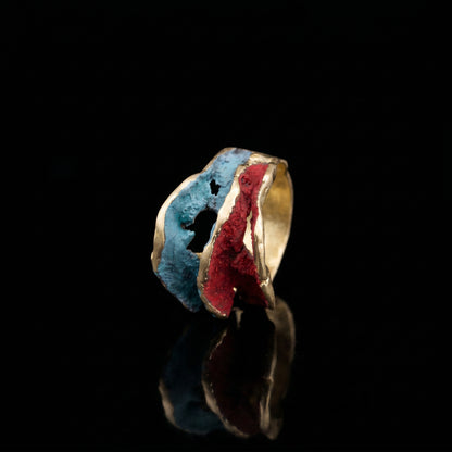 Gold-tone ring with blue and red resin inlay, textured open band