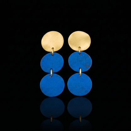 Gold-tone triple motion drop earrings with three blue discs