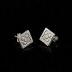 Silver square flower stud earrings with butterfly backs and embossed quatrefoil