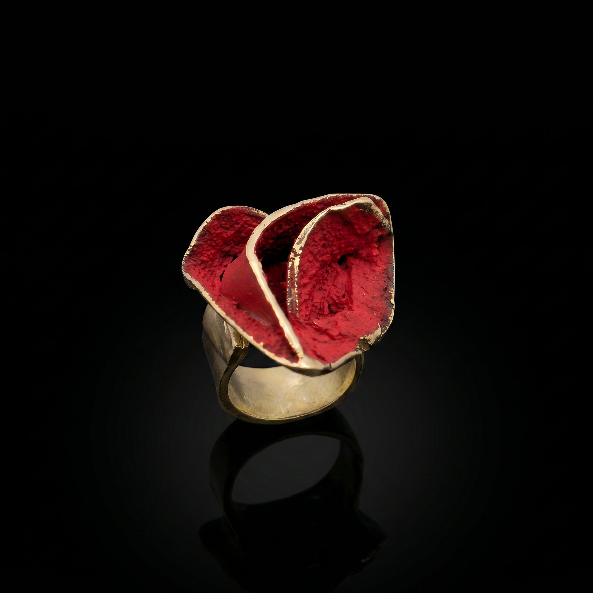 Rosella ring with gold-tone band and red textured gemstone top with white-gold edge