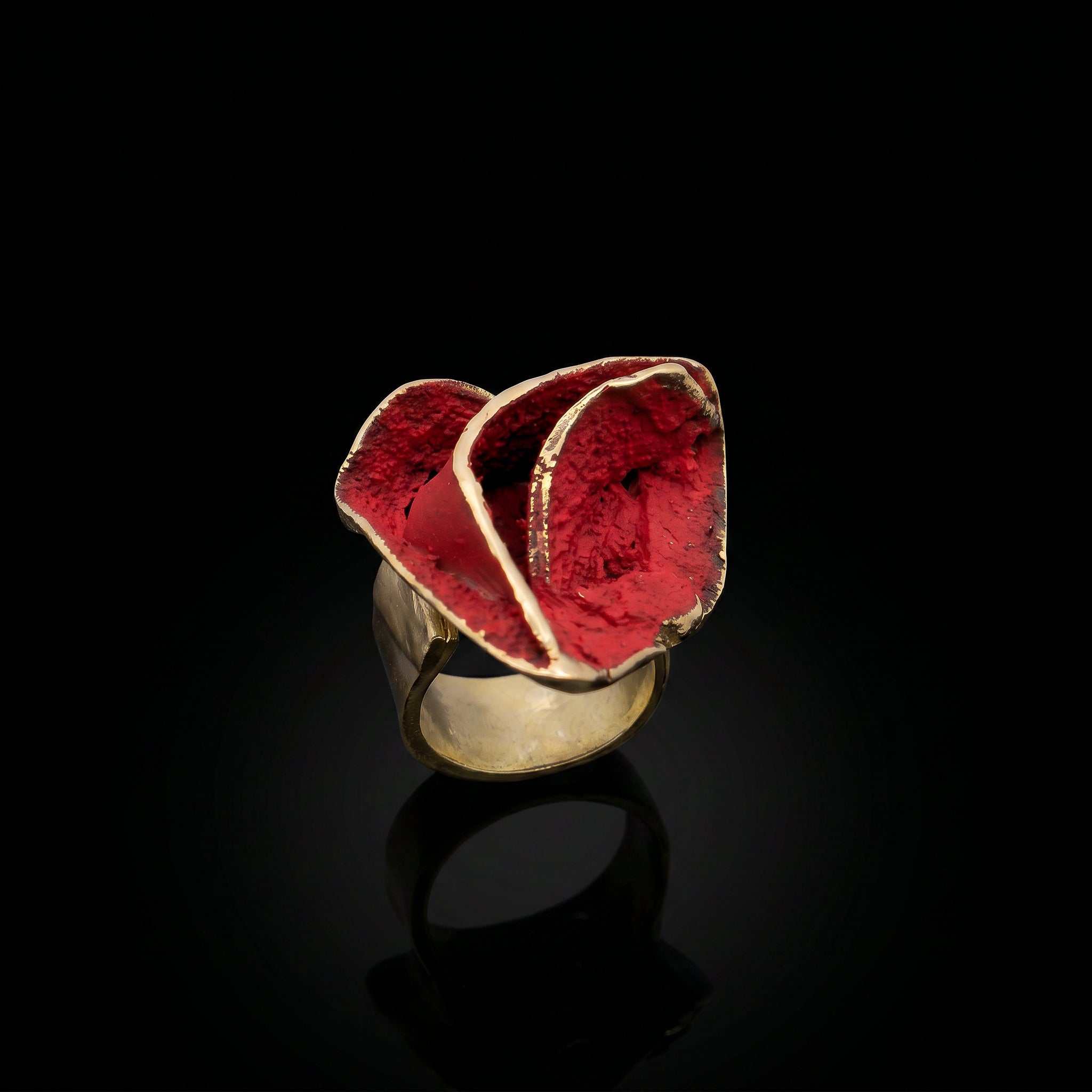 Rosella ring with gold-tone band and red textured gemstone top with white-gold edge