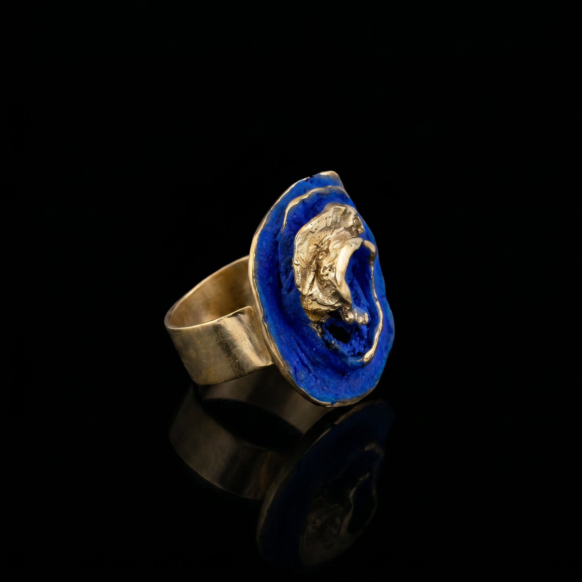 Ona Viva Ring gold-tone band with blue resin oval center