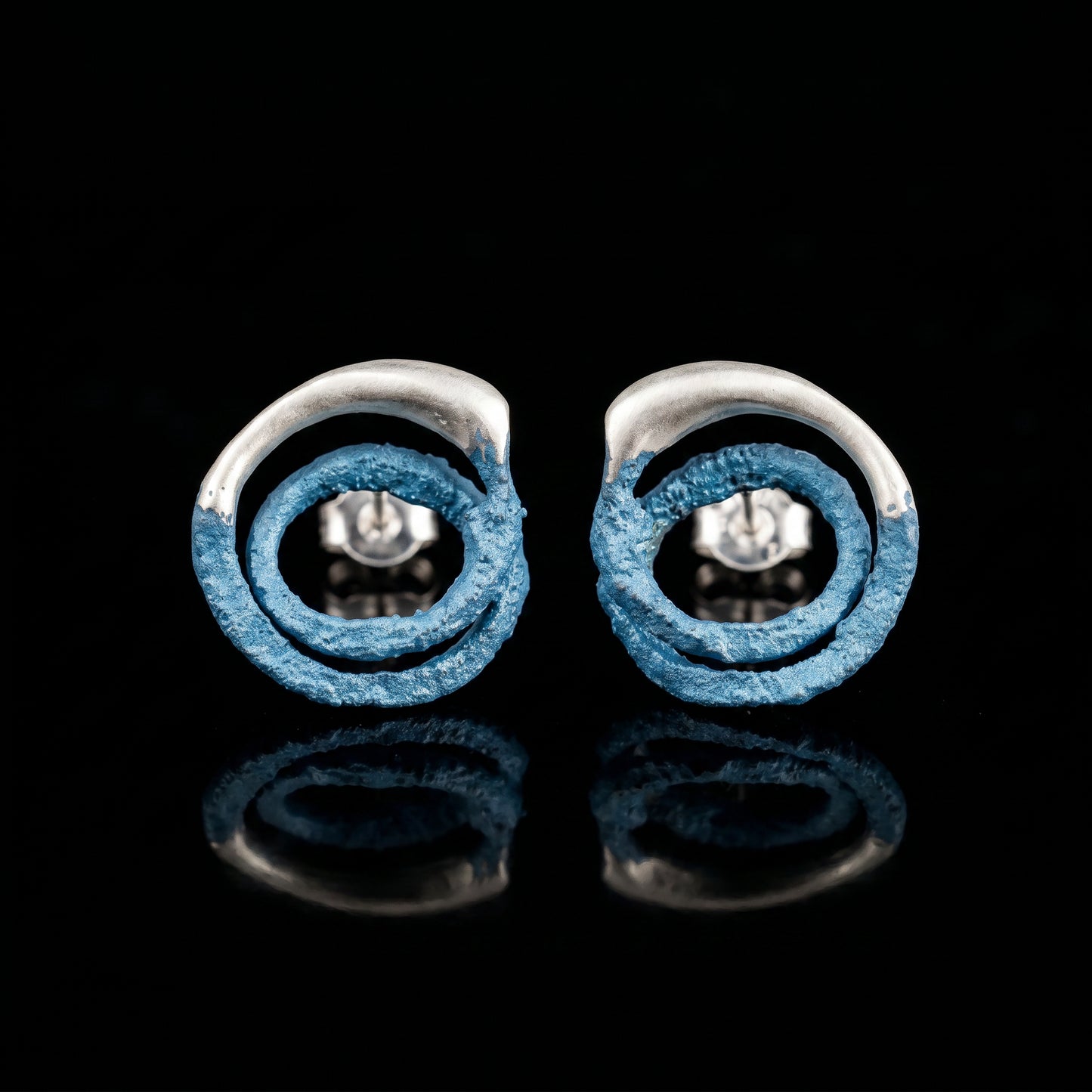 Trace hoop earrings with blue textured rings and silver posts