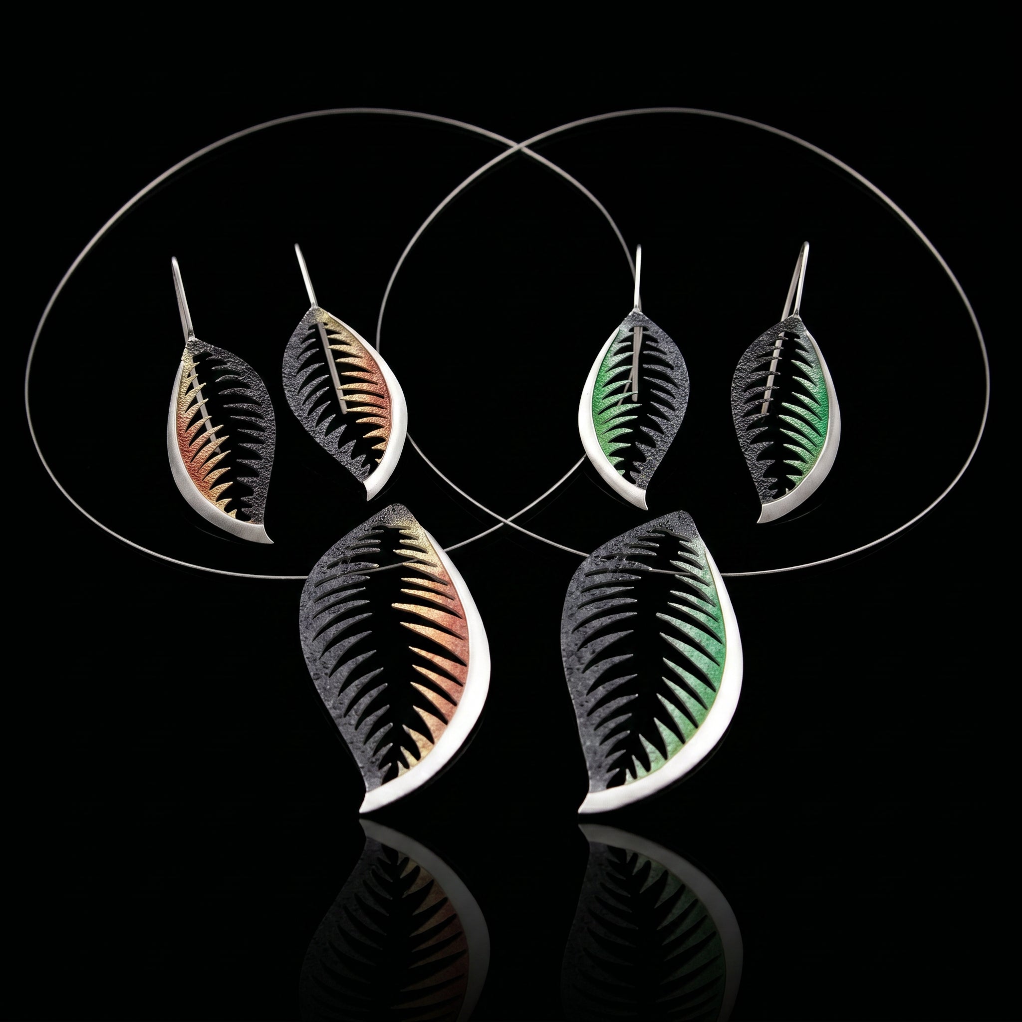 Five leaf-shaped 925 necklace pendants with colored vein inlays; silver chain